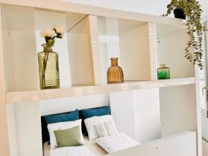 Postel nebo postele na pokoji v ubytování Serene Stay