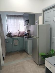 Kuchyň nebo kuchyňský kout v ubytování Cute Studio Apartment in Soufriere from Clavier's