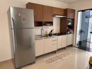 Dapur atau dapur kecil di Casa Sofisticada com Piscina