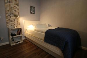 Postel nebo postele na pokoji v ubytování Hotel Freizeittempel