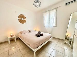 Ένα ή περισσότερα κρεβάτια σε δωμάτιο στο Villa Soleïa - Jardin, CLIM, 3 chambres, 8 personnes