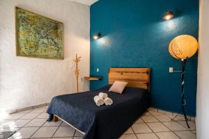 Rúm í herbergi á Ekko Hostel