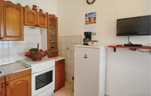 Η κουζίνα ή μικρή κουζίνα στο Holiday Home Trget Trget
