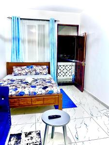 Φωτογραφία από το άλμπουμ του Bstan Airport Studio Apartment στη Μομπάσα +1 φωτογραφίες