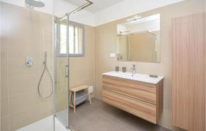a bathroom with a sink and a shower at Awesome Home In Saint-Rémy-De-Provence in Saint-Rémy-de-Provence +28 photos
