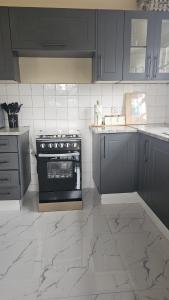 Kuchyň nebo kuchyňský kout v ubytování Dahlia + 6 fotografií