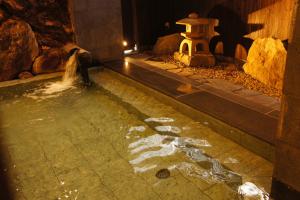 Fotografie z fotogalerie ubytování Kawaguchiya Kinosaki Riverside Hotel v destinaci Toyooka