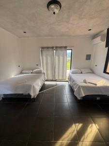Ένα ή περισσότερα κρεβάτια σε δωμάτιο στο Casa condado