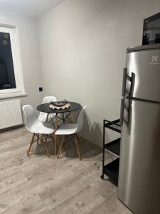 Kuchyňa alebo kuchynka v ubytovaní Apartament KOMPAS