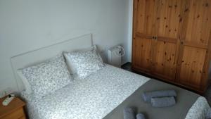 Postel nebo postele na pokoji v ubytování BNB LOLA - Habitacion privada - Aire acondicionado - Baños compartidos