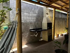 ナタールにあるBrisa Potiguar Flatsの屋外キッチン(レンガの壁にシンク付) +28枚の写真