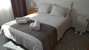 Postel nebo postele na pokoji v ubytování BNB LOLA - Habitacion privada - Aire acondicionado - Baños compartidos