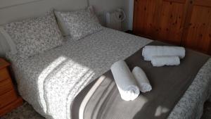 Postel nebo postele na pokoji v ubytování BNB LOLA - Habitacion privada - Aire acondicionado - Baños compartidos + 8 fotografií