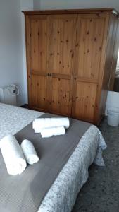 Postel nebo postele na pokoji v ubytování BNB LOLA - Habitacion privada - Aire acondicionado - Baños compartidos