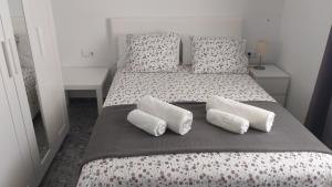 Postel nebo postele na pokoji v ubytování BNB LOLA - Habitacion privada - Aire acondicionado - Baños compartidos