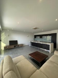 a living room with a couch and a table at Casa Klei in Ulcinj