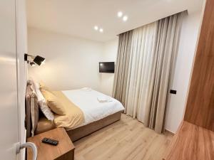 Postel nebo postele na pokoji v ubytování Bala Dream House