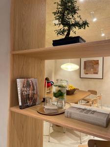 Televízia a/alebo spoločenská miestnosť v ubytovaní Hotel Boutique Astorga