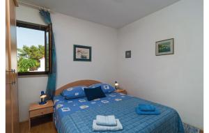 Postel nebo postele na pokoji v ubytování Apartment Supetar With Sea View Xii
