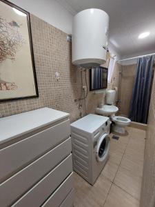 Koupelna v ubytování Garden apartmant near sea