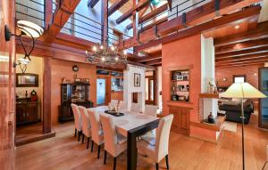 a dining room with a table and chairs at Cozy Home In Cakovec With Sauna in Čakovec