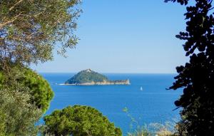 an island in the middle of a large body of water at 1 Bedroom Amazing Home In Onzo in Onzo