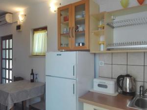 Kuchyňa alebo kuchynka v ubytovaní Apartments Soni