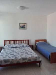Posteľ alebo postele v izbe v ubytovaní Apartments Soni + 25 fotografií