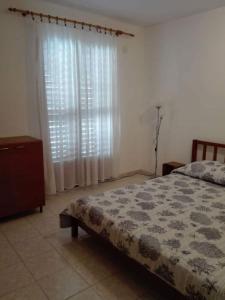 Posteľ alebo postele v izbe v ubytovaní Apartments Soni