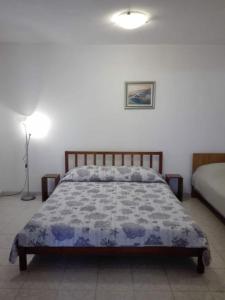 Posteľ alebo postele v izbe v ubytovaní Apartments Soni
