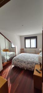 Łóżko lub łóżka w pokoju w obiekcie A Bruxo Fonte 8 pzs 2 baños Full Reg VUT38509