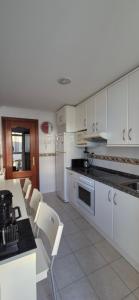 Kuchnia lub aneks kuchenny w obiekcie A Bruxo Fonte 8 pzs 2 baños Full Reg VUT38509