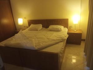 Postel nebo postele na pokoji v ubytování Sierra resort nabq