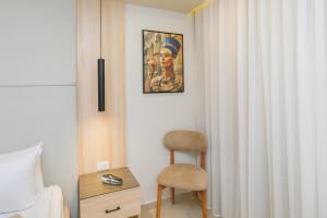 Postel nebo postele na pokoji v ubytování Tiye Pyramids Hotel