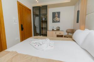 Postel nebo postele na pokoji v ubytování Tiye Pyramids Hotel