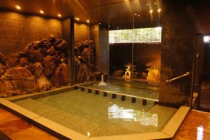 Fotografie z fotogalerie ubytování Kawaguchiya Kinosaki Riverside Hotel v destinaci Toyooka