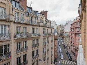 a view of a city street with buildings at Very attractive studio - 16ème - Mobility lease in Paris