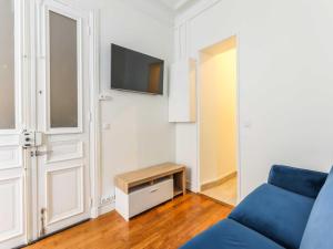 TV a/nebo společenská místnost v ubytování Superb souplex apt 2P - Mairie de Neuilly