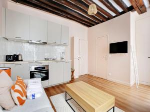 Kuchyň nebo kuchyňský kout v ubytování Charming studio- 2P- Le Marais + 4 fotografie
