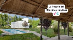 Swimmingpoolen hos eller tæt på Posada Del Montañés Cabañas