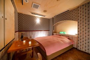 Postel nebo postele na pokoji v ubytování 恋からSweets