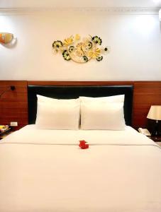 Voodi või voodid majutusasutuse Hoang Gia Hotel Cau Giay toas