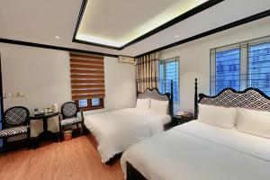 Voodi või voodid majutusasutuse Hoang Gia Hotel Cau Giay toas