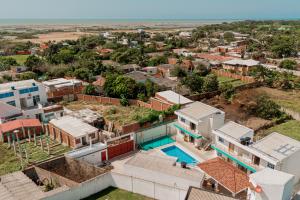 an aerial view of a house with a swimming pool at Casa campestre en punta canoa Cartagena in Punta Canoas