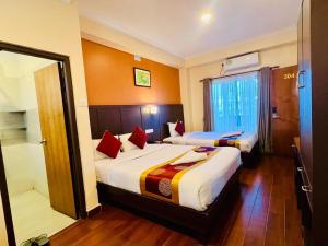 Katil atau katil-katil dalam bilik di Hotel Eco Tree Pokhara