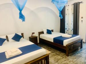 Ένα ή περισσότερα κρεβάτια σε δωμάτιο στο KD Homes