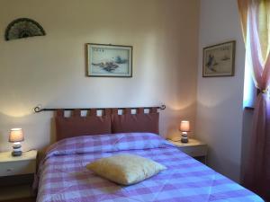 A bed or beds in a room at Gelso