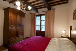 Кровать или кровати в номере Poggio Al Vento