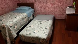 Postel nebo postele na pokoji v ubytování Hostal Hibisco