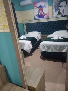 Letto o letti in una camera di Prince Hotel Fier